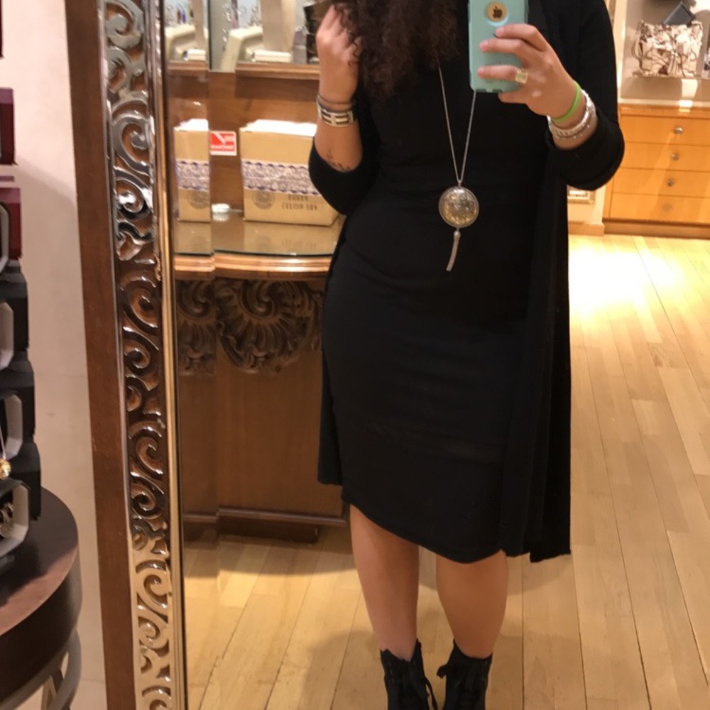 sexy black dress comes below knees